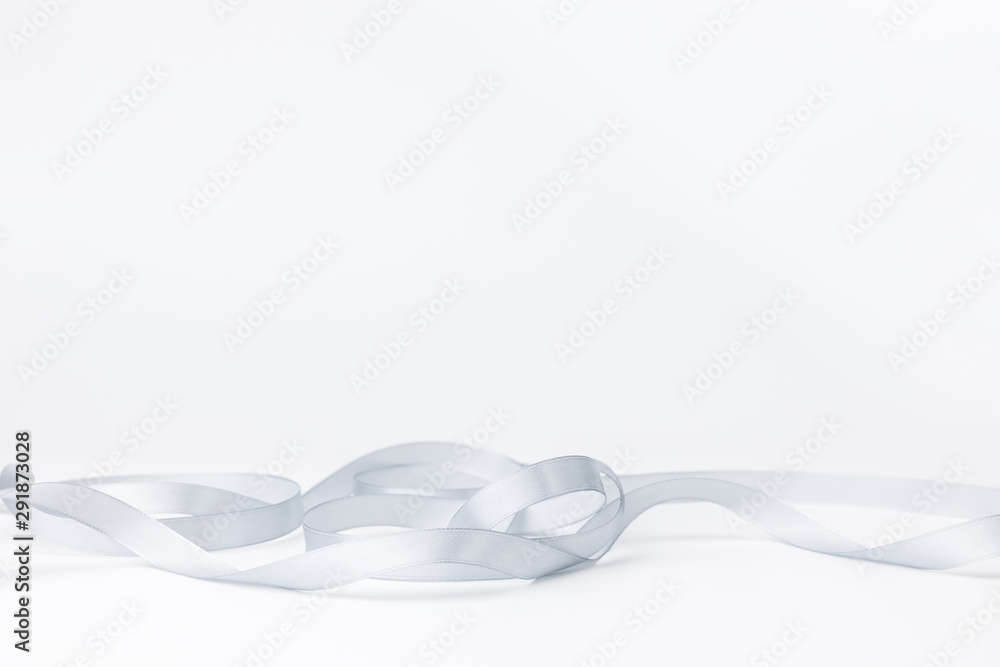 Silver ribbon on a white background Silver ribbon on a white background