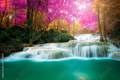 Amazing in nature  beautiful waterfall at colorful autumn forest in fall season