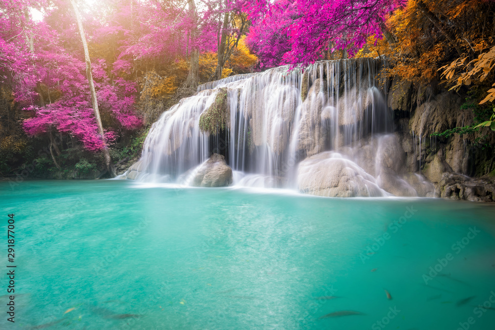 Amazing in nature, beautiful waterfall at colorful autumn forest in fall season Amazing in nature, beautiful waterfall at colorful autumn forest in fall season