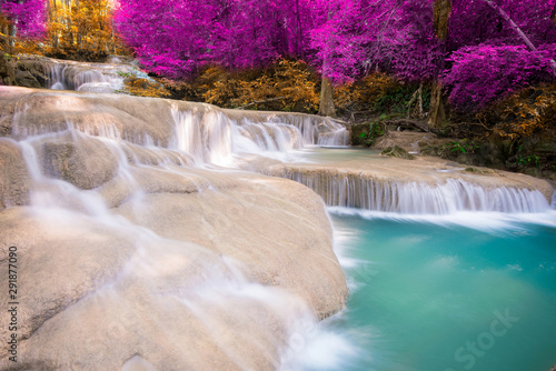 Amazing in nature, beautiful waterfall at colorful autumn forest in fall season