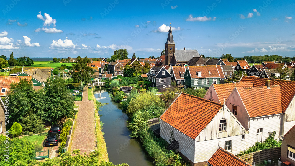 Aerial drone view of Marken island, traditional fisherman village from above, typical Dutch landscape, North Holland, Netherlands