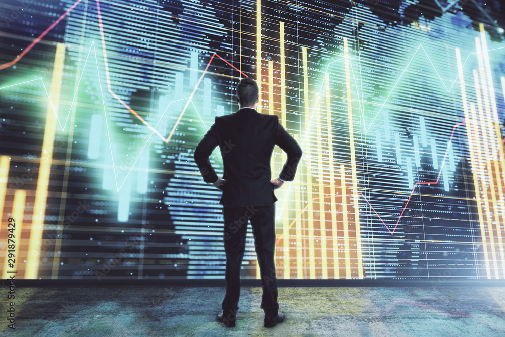 Businessman and forex graph and world map hologram. Double exposure. Concept of financial education and analysis Businessman and forex graph and world map hologram. Double exposure. Concept of financial education and analysis