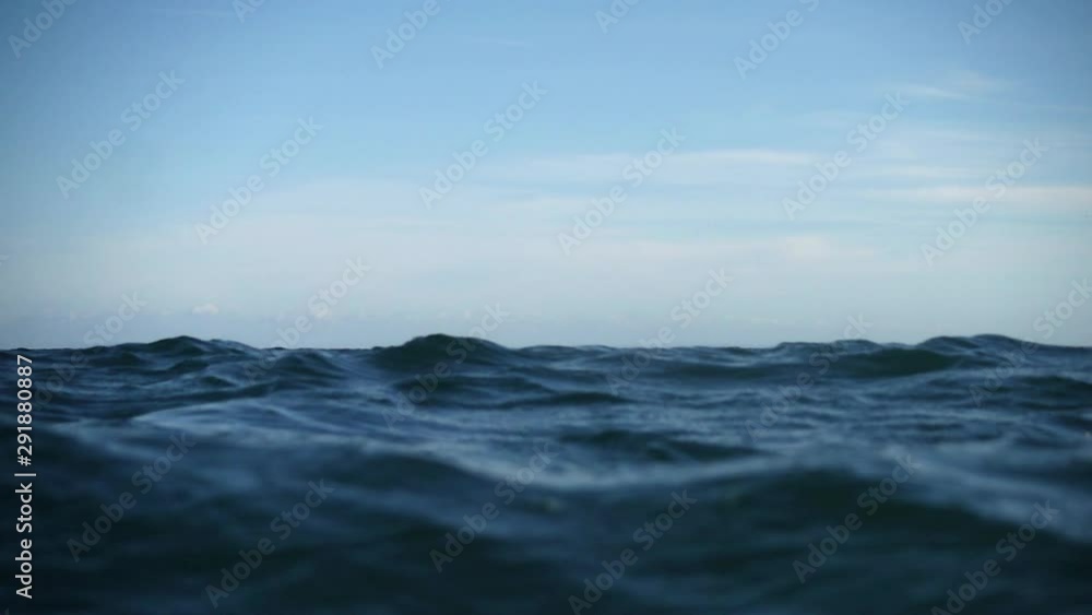 The slow motion of the water surface creates a beautiful bokeh effect. when water flows down from the lens, interesting optical effects and caustics are created. The slow motion of the water surface creates a beautiful bokeh effect. when water flows down from the lens, interesting optical effects and caustics are created.