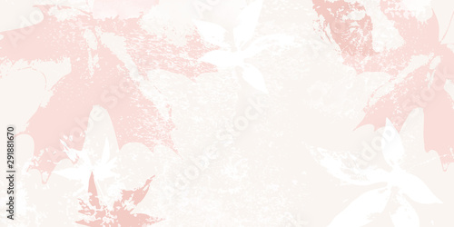 Autumnal maple leaves in pastel coral brown colors