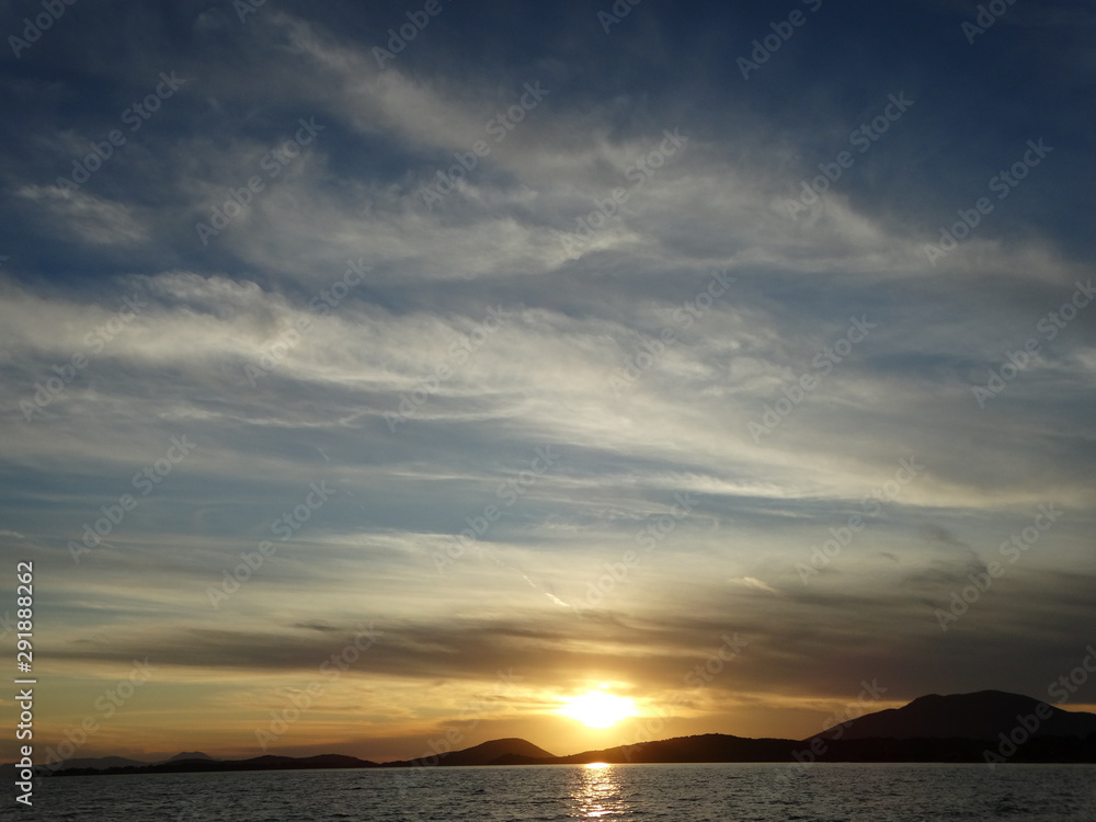 golden hour beautiful colors cloudy sunset horizon above sea at evening igoumenitsa city greece