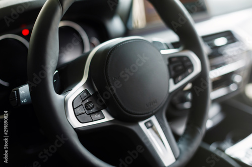 Modern luxury car Interior. Automotive detail in a new car © VAKSMANV