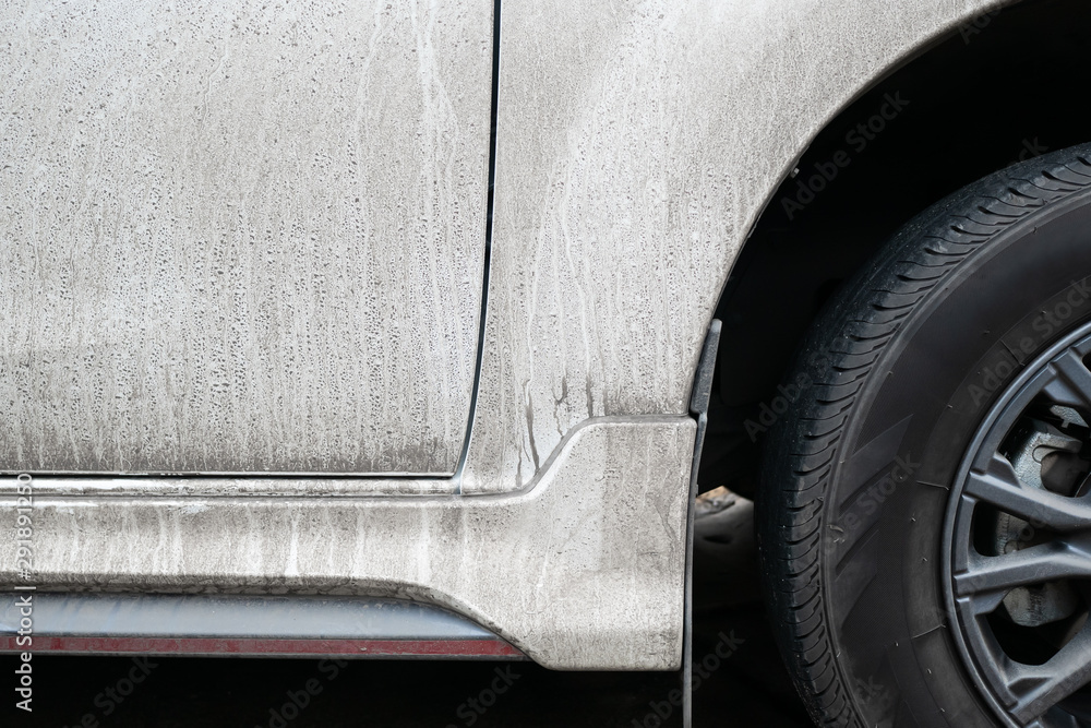 side-view-of-dirty-white-car-stock-photo-adobe-stock
