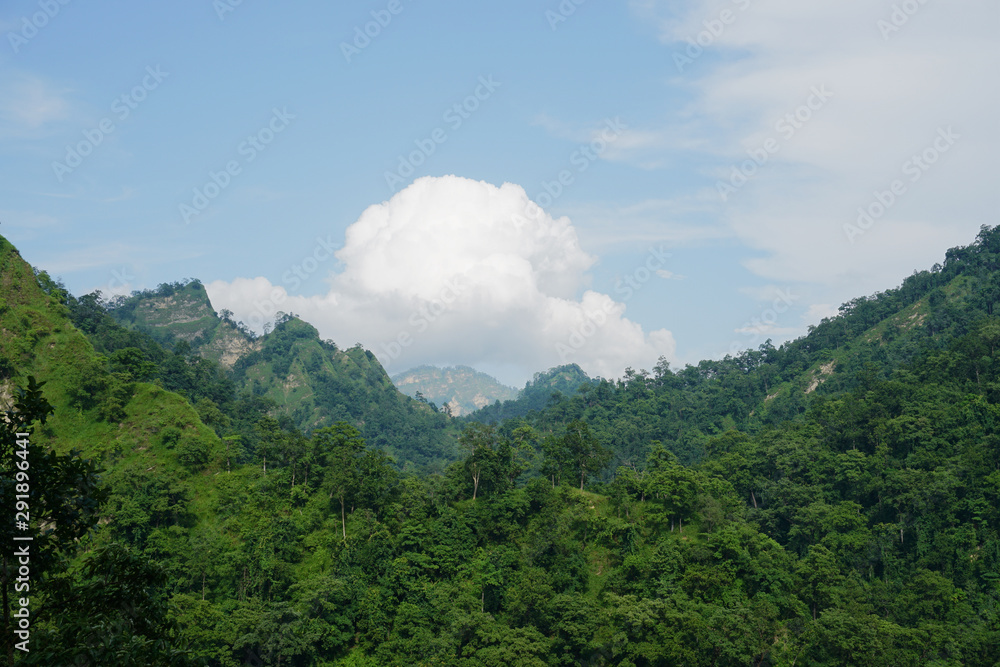 Cloud over a mountain range