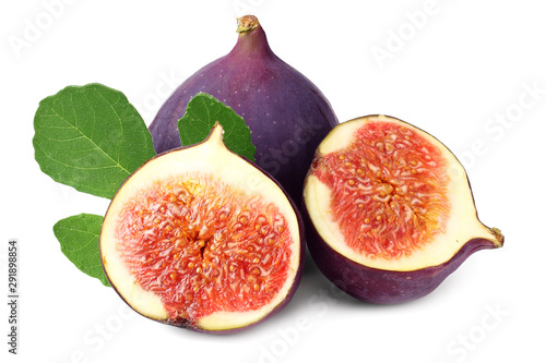 Fig fruit with slices and green leaf isolated on white background