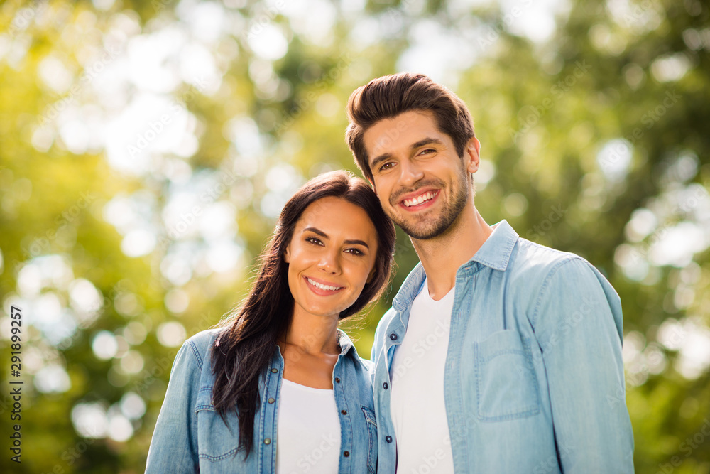 Photo of overjoyed pair attending green summer park wear denim outfit Photo of overjoyed pair attending green summer park wear denim outfit