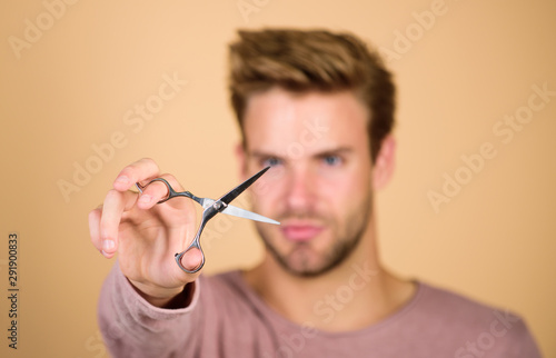 scissors selective focus. Barbershop concept. barber work. Hair care equipment. male grooming. styling beard hair. getting hairstyle. Barber self care. handsome man with hairdresser scissors