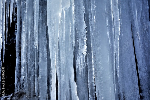 Long icicles off a cliff