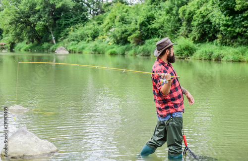 Fishing outdoor sport. Fishing hobby. Teach man to fish. Fly fishing may well be considered most beautiful of all rural sports. Fisherman lucky catching fish. Good things come to those who bait