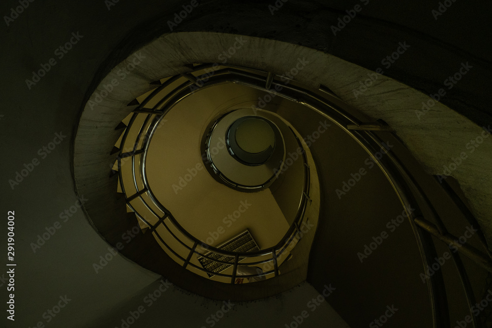 Fototapeta premium The spiral staircase detail in a beautiful of the building.