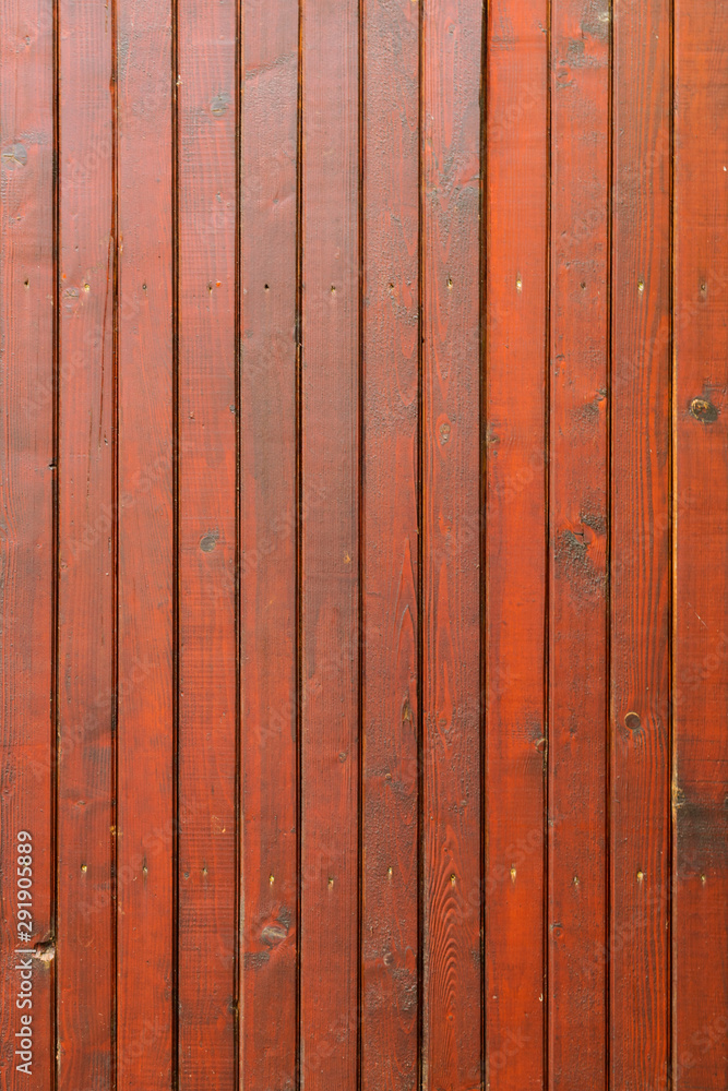 stained wood planks fence background - vertical lines stained wood planks fence background - vertical lines