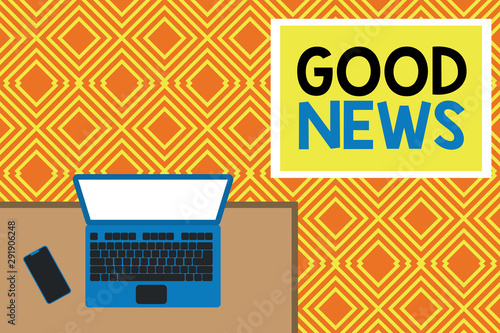 Conceptual hand writing showing Good News. Concept meaning Someone or something positive,encouraging,uplifting,or desirable Office working place laptop lying wooden desk smartphone photo