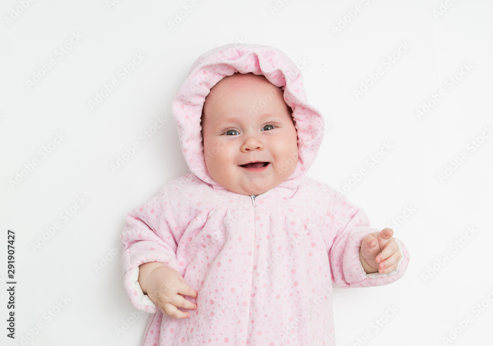 Cute baby dressed in warm overall for winter cold weather. Cute baby dressed in warm overall for winter cold weather.