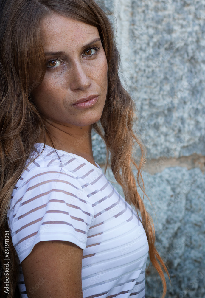 portrait of a woman with freckles