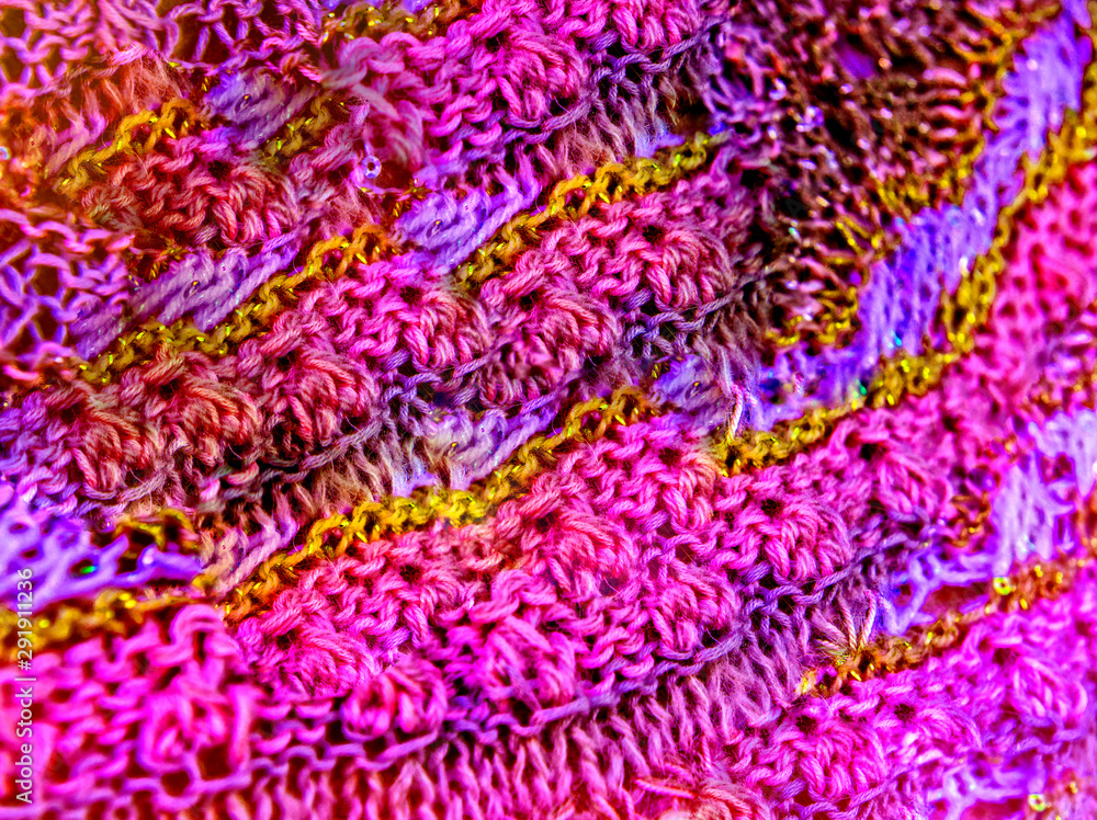 Knitted yellow and pink texture