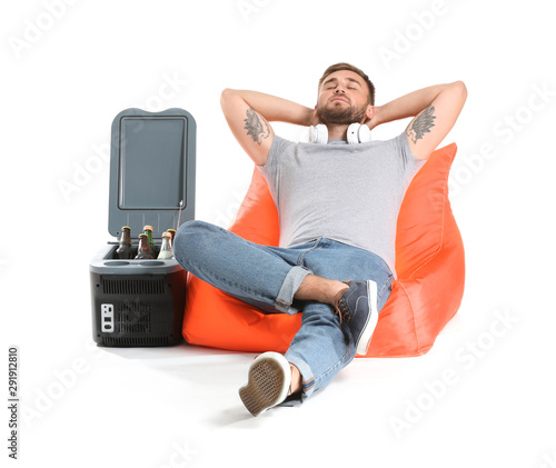 Handsome young man relaxing...