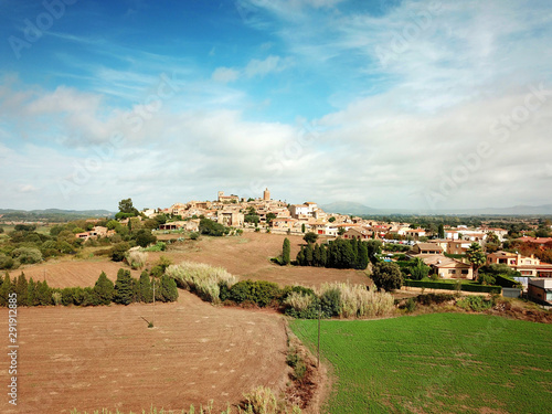 Aerial view medieval small village Pals in Catalonia, Spain. Mediterranean cities for tourism, drone shot. Empty copy space for Editor's text. #291912885