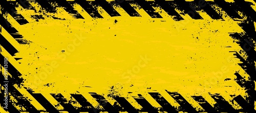 Fotografie grunge banner with grunge warning symbol