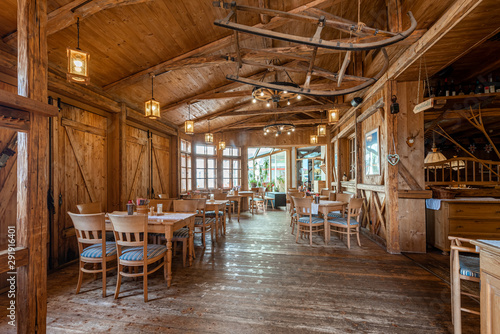 The interior of the restaurant in a rustic style. Country Style Restaurant. sled