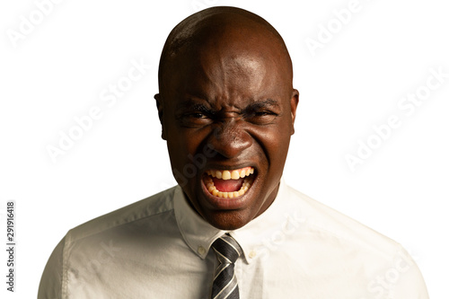 Young businessman screaming