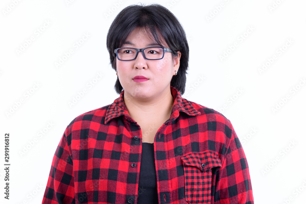 Face of beautiful overweight Asian hipster woman thinking