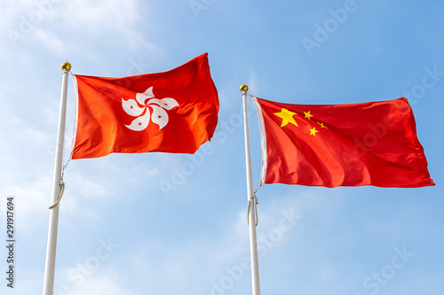 Photography Hong Kong and Chinese Flag in Blue Sky
