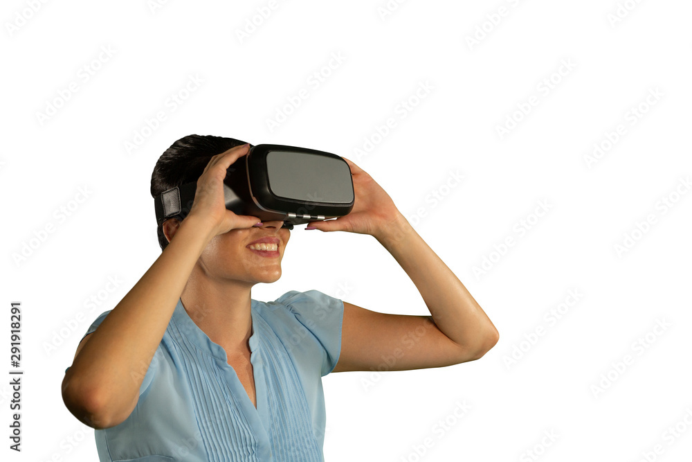 Young businesswoman using a VR headset Young businesswoman using a VR headset