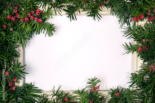 Christmas tree branches and frame for note.
