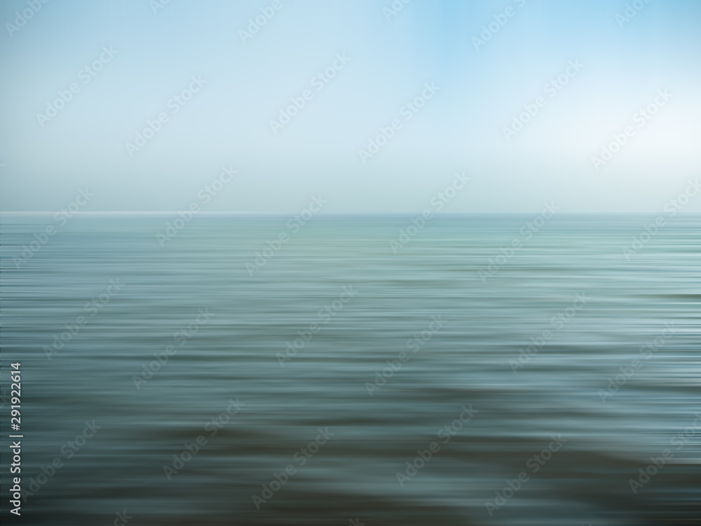 An abstract seascape with blurred panning motion and blue sky An abstract seascape with blurred panning motion and blue sky