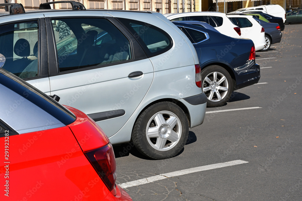 Cars in the parking lot in the city Cars in the parking lot in the city