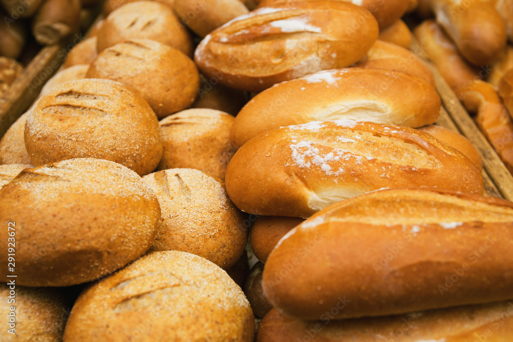 Fresh baked bread at the market closeup. Food background concept