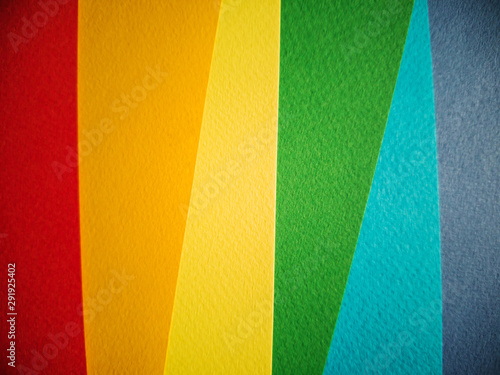 Background in the colors of the LGBT flag. Texture sheets of paper. Red, orange, yellow, green, blue, purple. LGBT Pride Flag Includes LGBT, Lesbian, Gay, Bisexual, and Transgender Flag