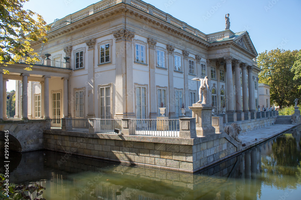 Warsaw/ Poland - September 22 2019: Lazenkovsky Palace on autumn - a small chamber residence of the last Polish king Stanislav Poniatowski on an artificial island in the Lazenkovsky park in Warsaw.