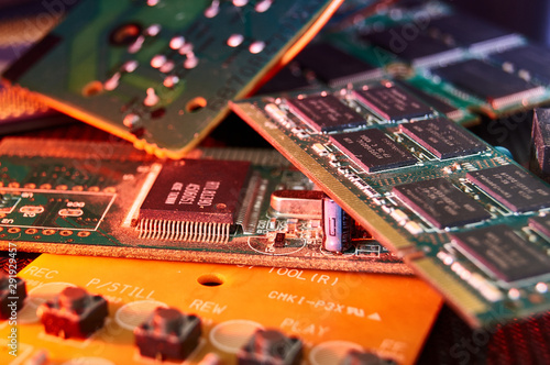 various chips, digital boards. Components of technical devices in creative lighting. Processor, RAM and other parts