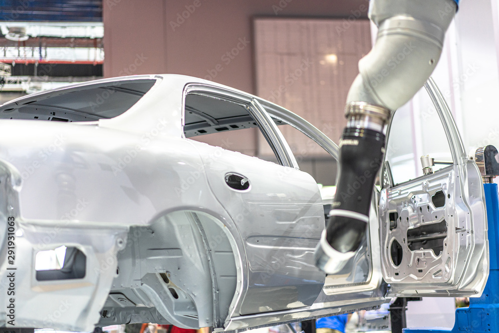 robot arm working in car factory robot arm working in car factory