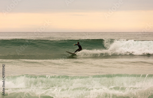 Surfer at sunset