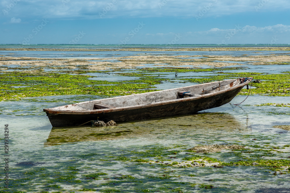 Fototapeta Old wooden boat on ocean
