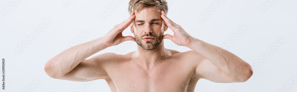 panoramic shot of shirtless man with migraine touching temples isolated on grey panoramic shot of shirtless man with migraine touching temples isolated on grey