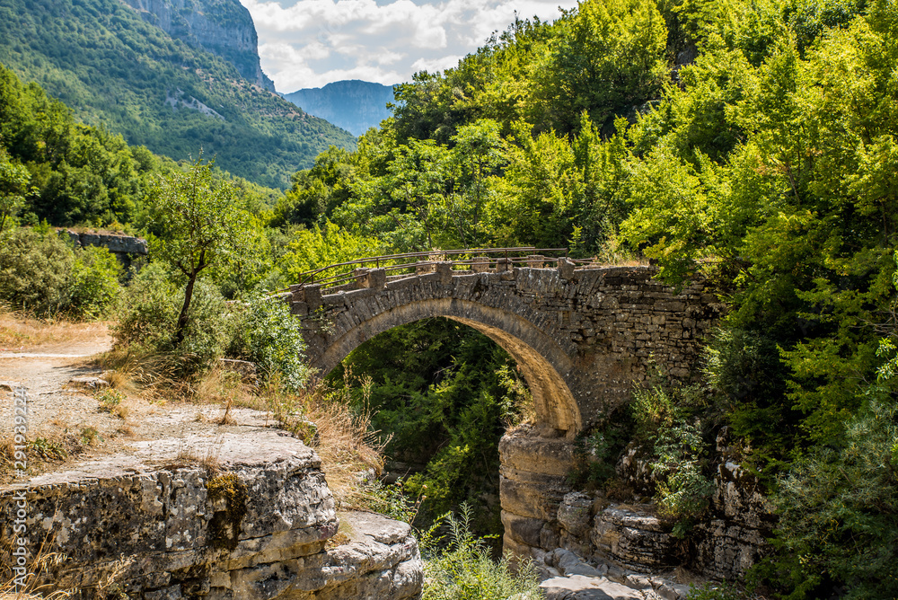 Old small arched stone bridge of Lakou or Loli's, between the micro and megalo Papingo villages