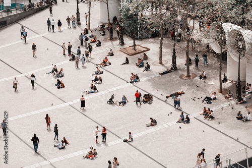 Photography Crowds of tourists resting on a city square near Pompidou Center
