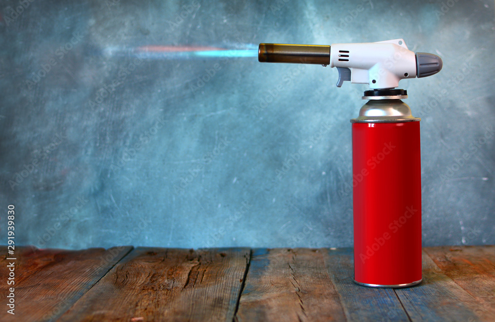Household gas cylinder for portable gas stoves or lights with gas-jet flame  gun Stock-Foto | Adobe Stock