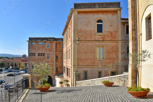 The building of a cathedral in an old town in the Lazio region. photo
