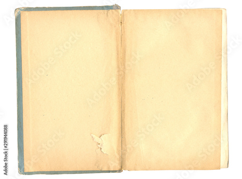 A photo of an old opened book with empty pages, a template for text or pictures.