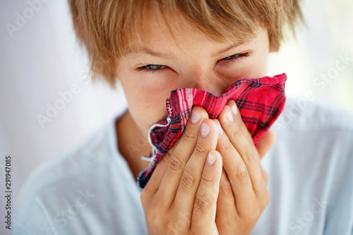 Allergy. Child boy teenager is sick.  photo