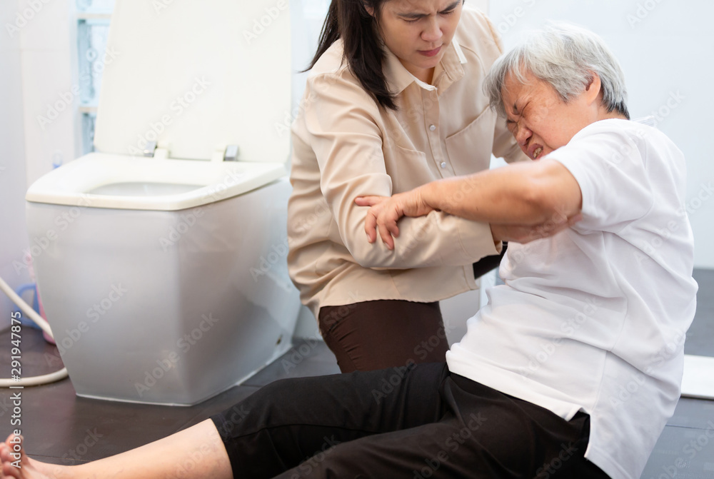 Asian elderly woman on floor in bathroom after falling down because  slippery surfaces,caregiver or daughter help,care support,sick senior  mother fell to the floor in toilet because of dizziness,faint Stock Photo |  Adobe
