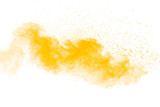 Abstract yellow powder explosion on white background.Freeze motion of yellow dust particles splash.